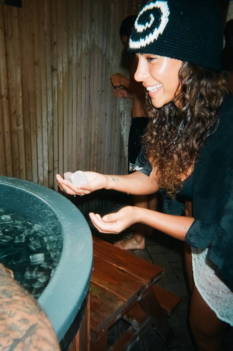 Guest by the cold tub outside the sauna