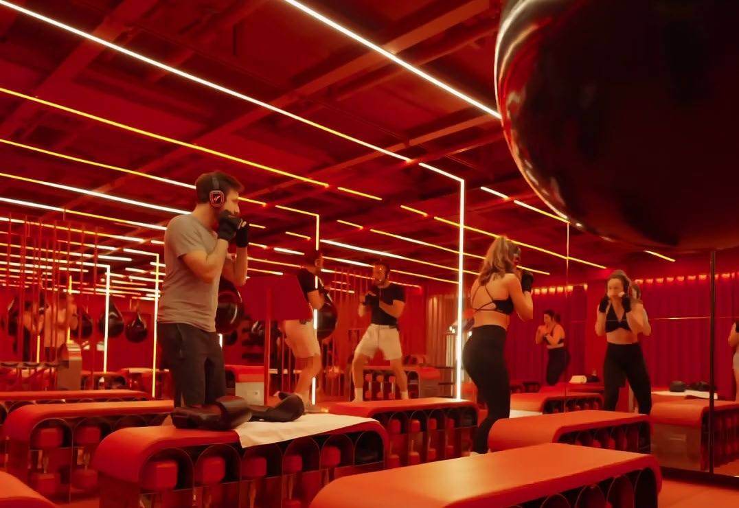 Red-lit boxing studio